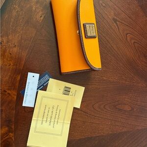 Dooney & Bourke Orange Leather Clutch